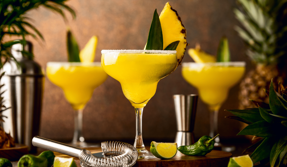 Mix mango nectar, pineapple juice, and a splash of lime juice